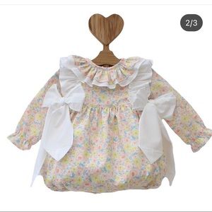 Puro mimo white floral blue and pink Easter romper $80 18 months